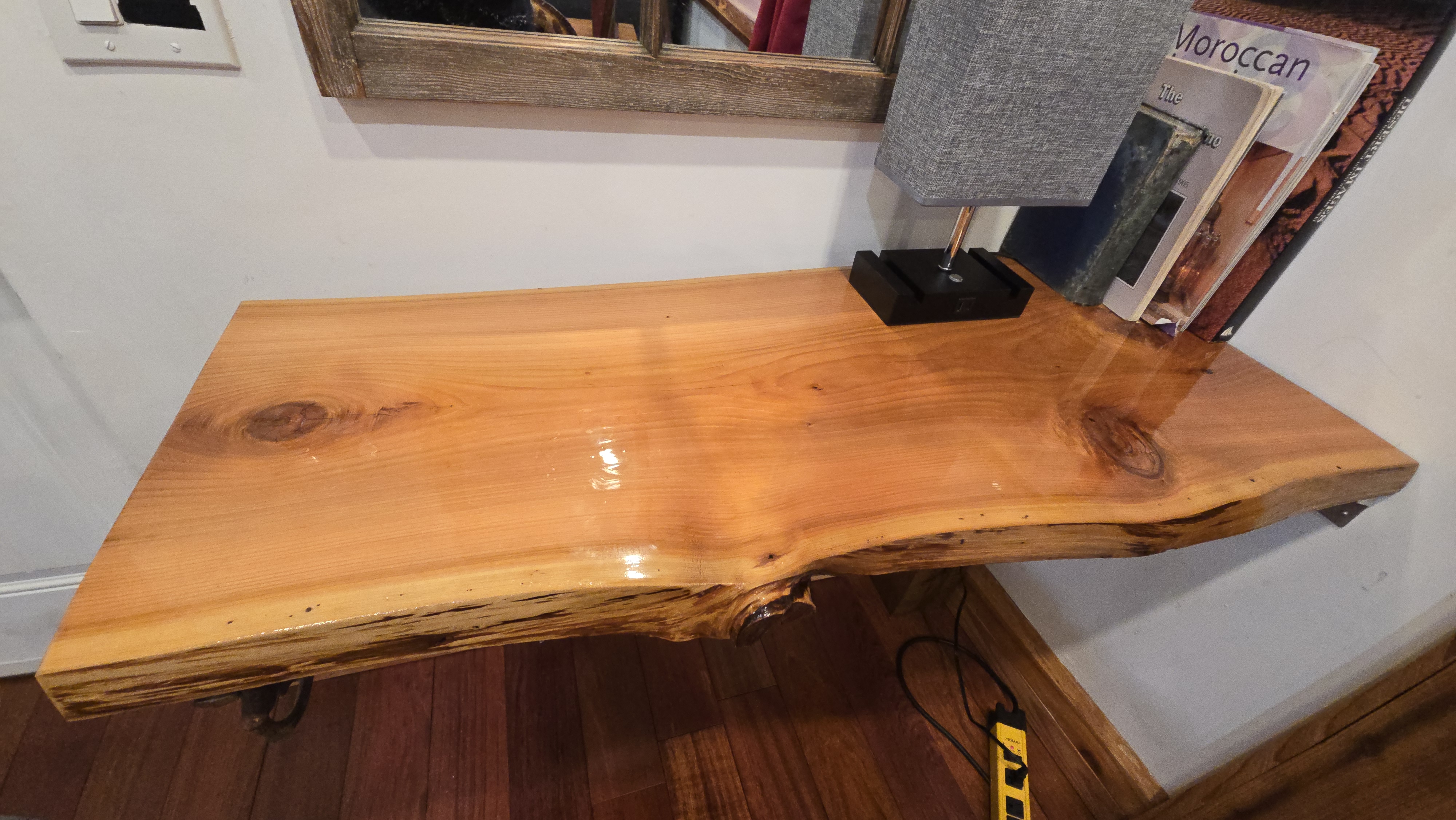 Woodworking hands turing lumber into art